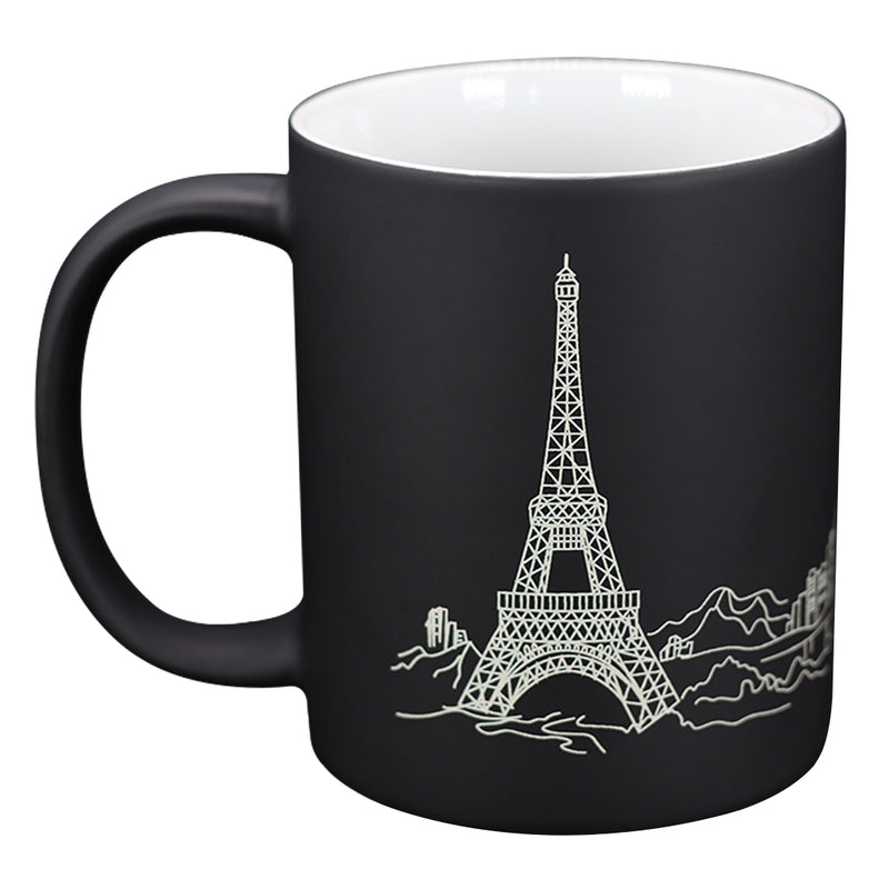 TAZA MÁGICA NEGRA CON DISEÑO DE TORRE EIFFEL