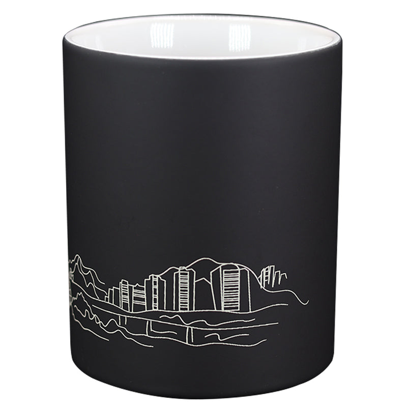 TAZA MÁGICA NEGRA CON DISEÑO DE TORRE EIFFEL