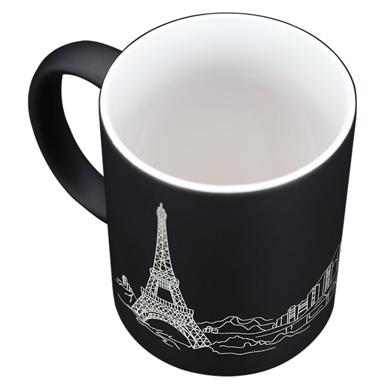 TAZA MÁGICA NEGRA CON DISEÑO DE TORRE EIFFEL